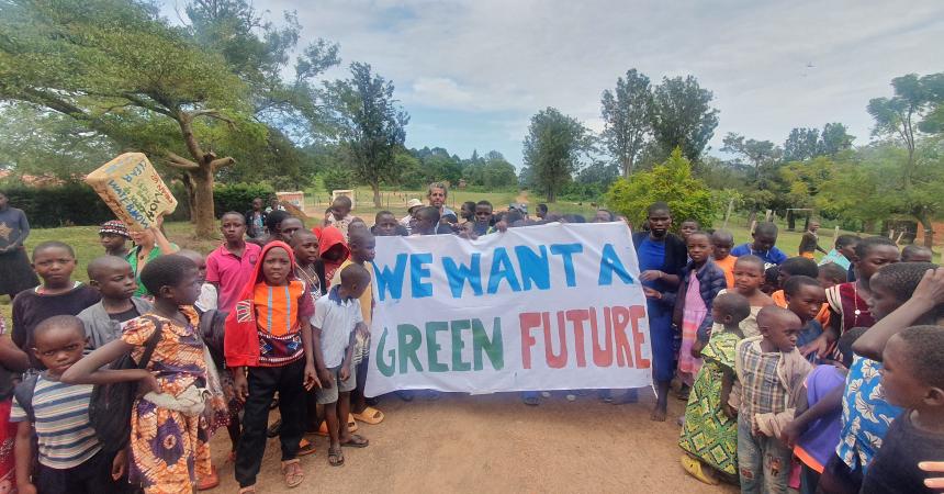 Children in Uganda march for a green future