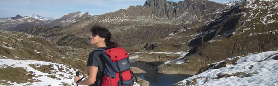Woman hiker in mountain landscape