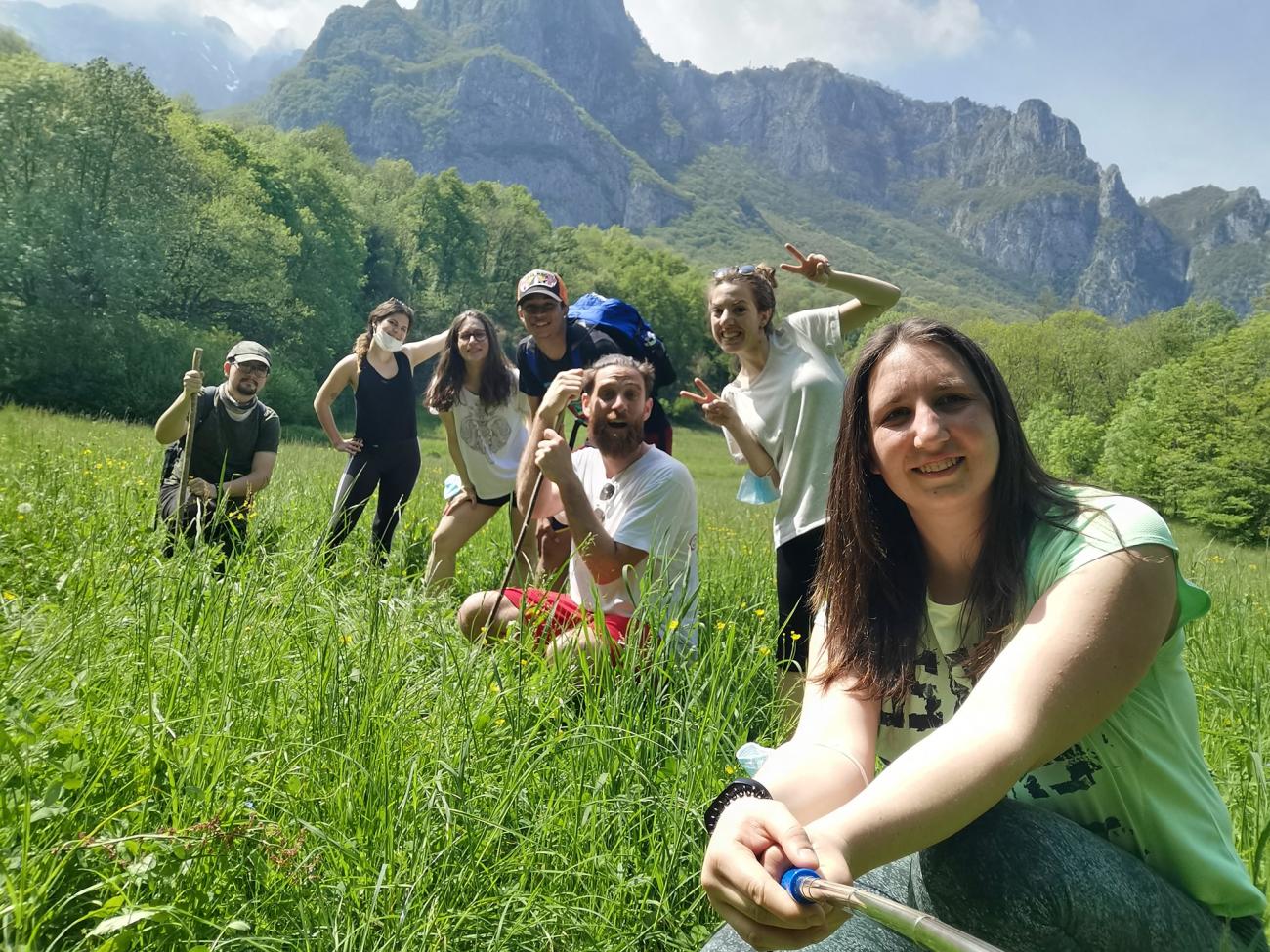 Youth Italy hiking together in the mountains